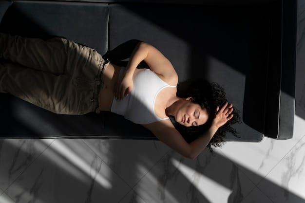 A person lying down with their eyes closed, bathed in soft light, participating in a body scan meditation.