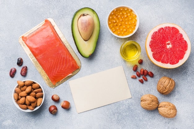 A close-up shot of various vitamin D-rich foods, such as fatty fish (salmon, tuna), fortified milk, and eggs, artistically arranged to highlight their nutritional value.