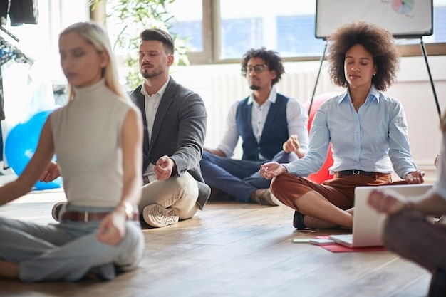 A diverse group of professionals participating in a wellness seminar during lunch break at their office, emphasizing the importance of mental health and well-being.
