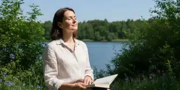 Serene professional enjoying nature, away from digital devices, symbolizing a digital detox.