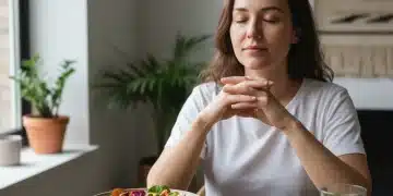 Mindful Eating in 2026: Boost Digestion & Energy 15% with 4 Shifts Person practicing mindful eating, contemplating a healthy meal before eating